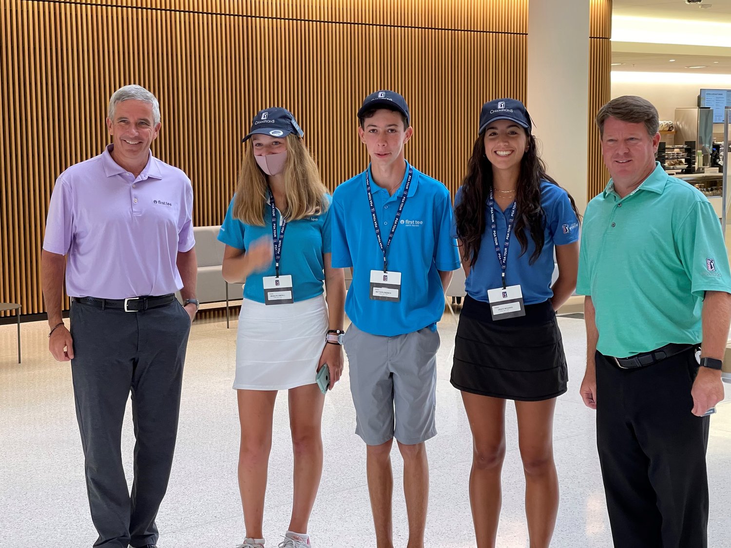 PGA Tour Commissioner Jay Monahan (far left) and PGA Tour Champions President Miller Brady (far right) informed Madelyn Campbell, Matthew French and Grace Richards they were invited to play Pebble Beach Golf Links in September.